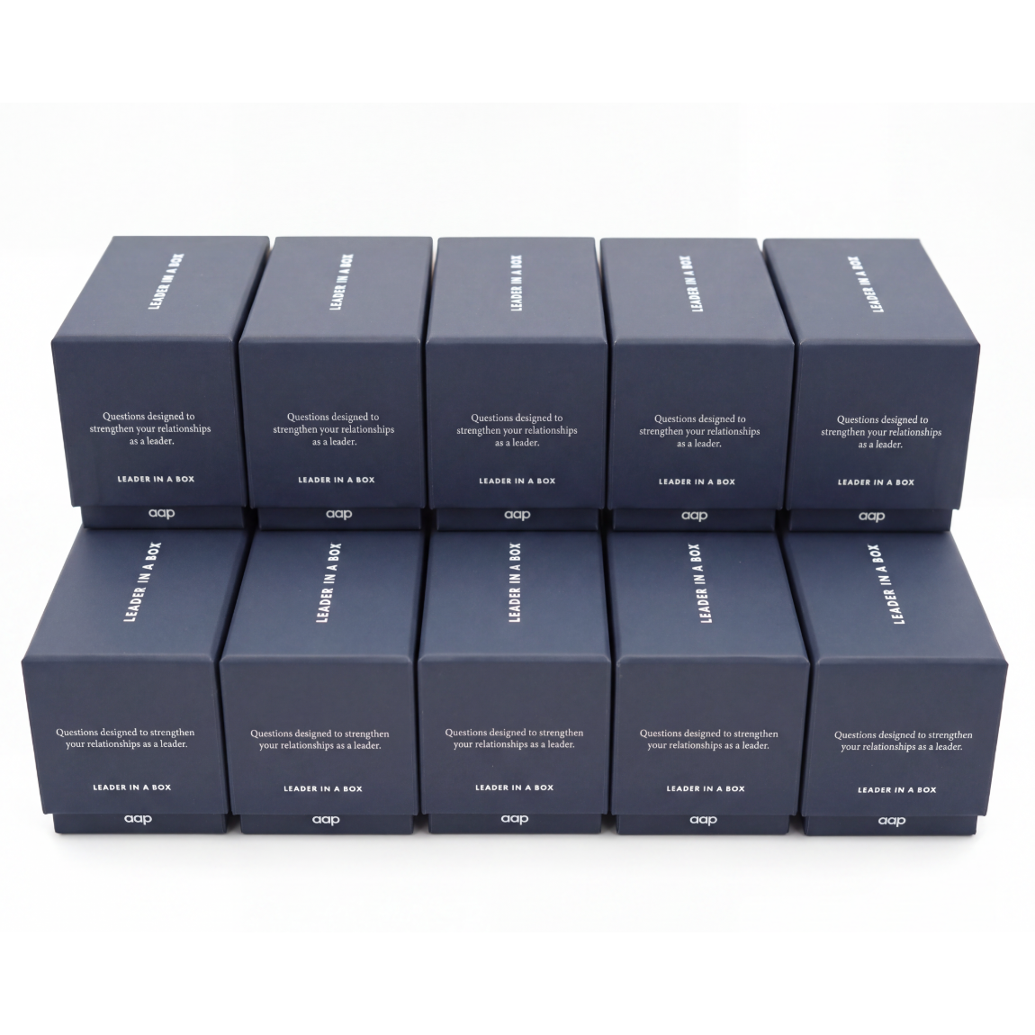Ten Leader in a Box decks in navy boxes, stacked two rows of five
